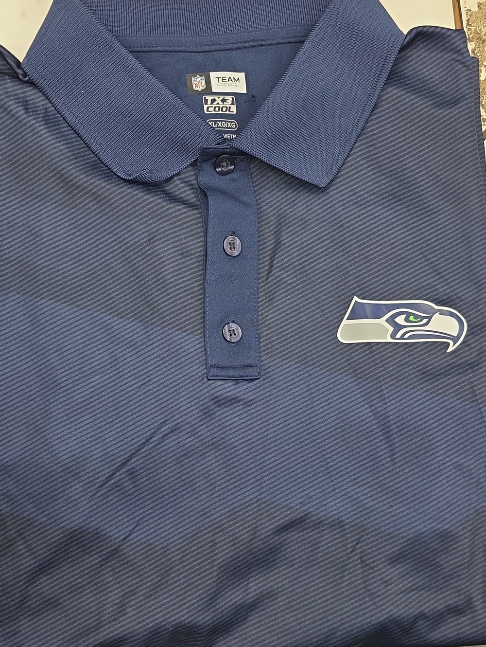 Team Apparel Navy Performance Polo with Seahawks Logo